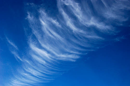 Cirrus clouds can mark the approach of a warm front – and rain.
