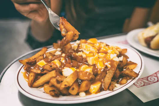 Poutine is fast food, friendly, joyful and associated with nightlife. 