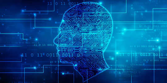 Bên trong đầu của một người đàn ông trông giống như sơ đồ của một bo mạch chủ máy tính.