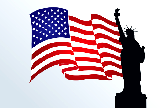 Το άγαλμα της ελευθερίας και μια αμερικανική σημαία
