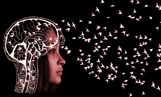 side view of a woman's face and brain with all these thoughts flying out of her brain as birds