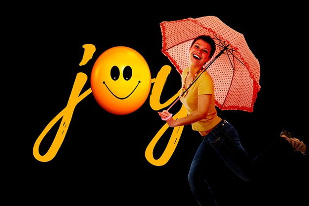 a joyful woman holding a parasol