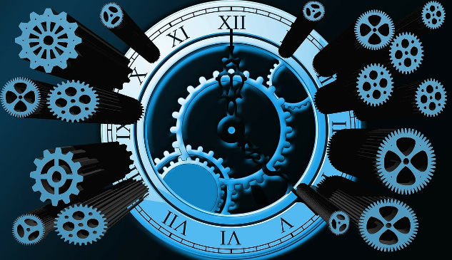 gears of a clock meshing together