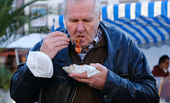 man eating fast food