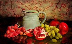 a still life painting of various fresh fruits and a clay pitcher