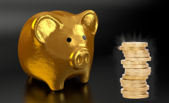 sebuah bank piggy emas dengan timbunan syiling emas