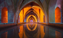 arches reflected in water