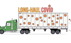 en stor lastbil med et skilt, hvor der står "Long-Haul Covid"
