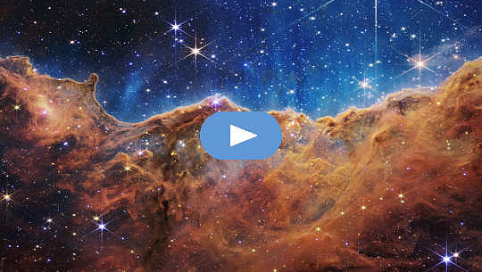 "Cosmic Cliffs" in the Carina Nebula, where new stars are birthed.