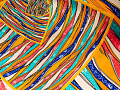 Colorful strands of fabric. Image by Engin Akyurt from Pixabay. 