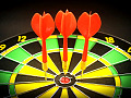 3 darts side by side on a dart board