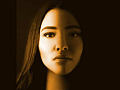 woman's face with half of it in shadows