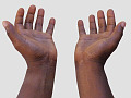 two hands opened out in a giving and/or receiving position