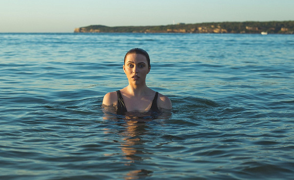 woman in the sea and surrounded by water
