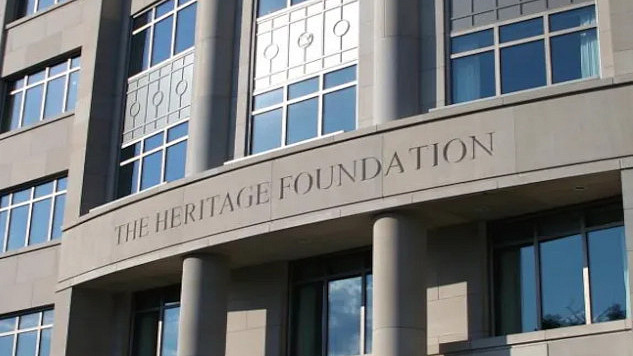 A depiction of the Heritage Foundation’s influence on U.S. governance showing how its policy blueprints have eroded democracy and concentrated power among elites.