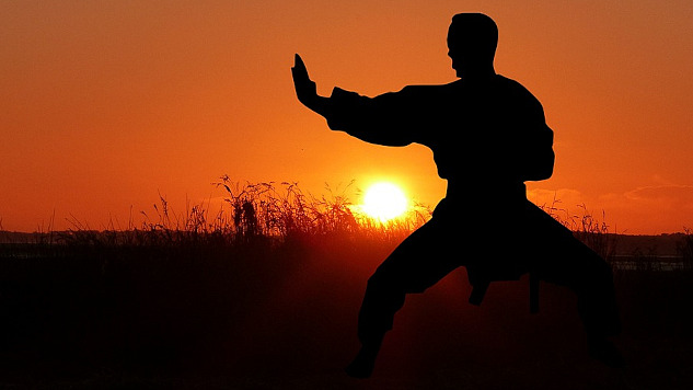 a person practicing a meditative form of martial arts