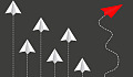 cerf-volant rouge volant dans sa propre direction différente