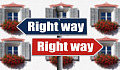 two signs, pointing opposite directions, both saying 'Right Way'