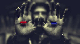 man in shadows holding out a red pill in one hand and a blue pill in the other