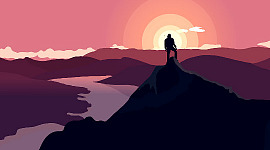en person som står på toppen av berg på högre mark
