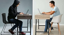 兩個人在兩個不同的位置使用筆記本電腦進行通信