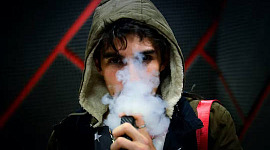 a photo of someone vaping