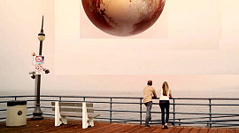 couple looking out at a hugely enlarged sphere of Pluto