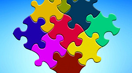яркие разноцветные кусочки головоломки, соединенные вместе