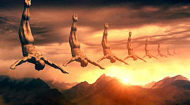 天空中的男性人物在太阳前俯冲